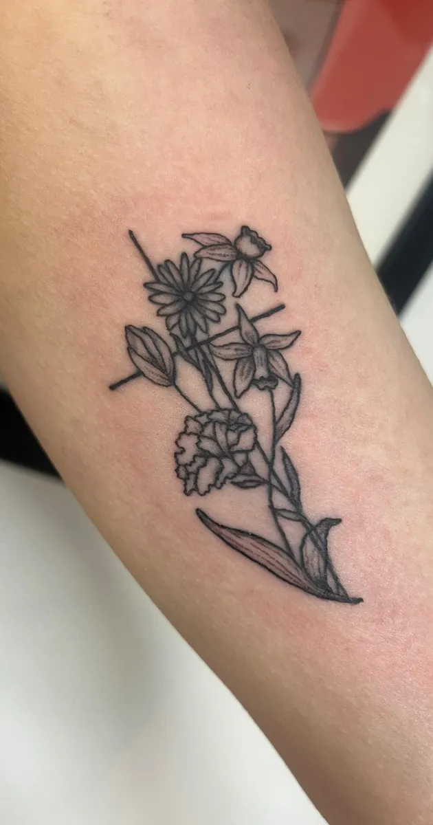 Birth flower bouquet — fine line on the arm