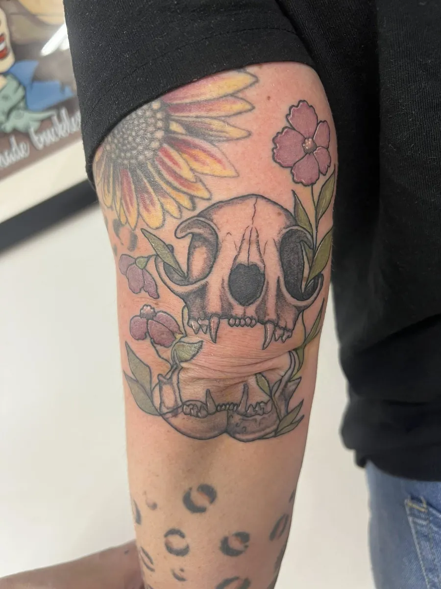 Cat skull with sunflower & wildflowers — color, bicep