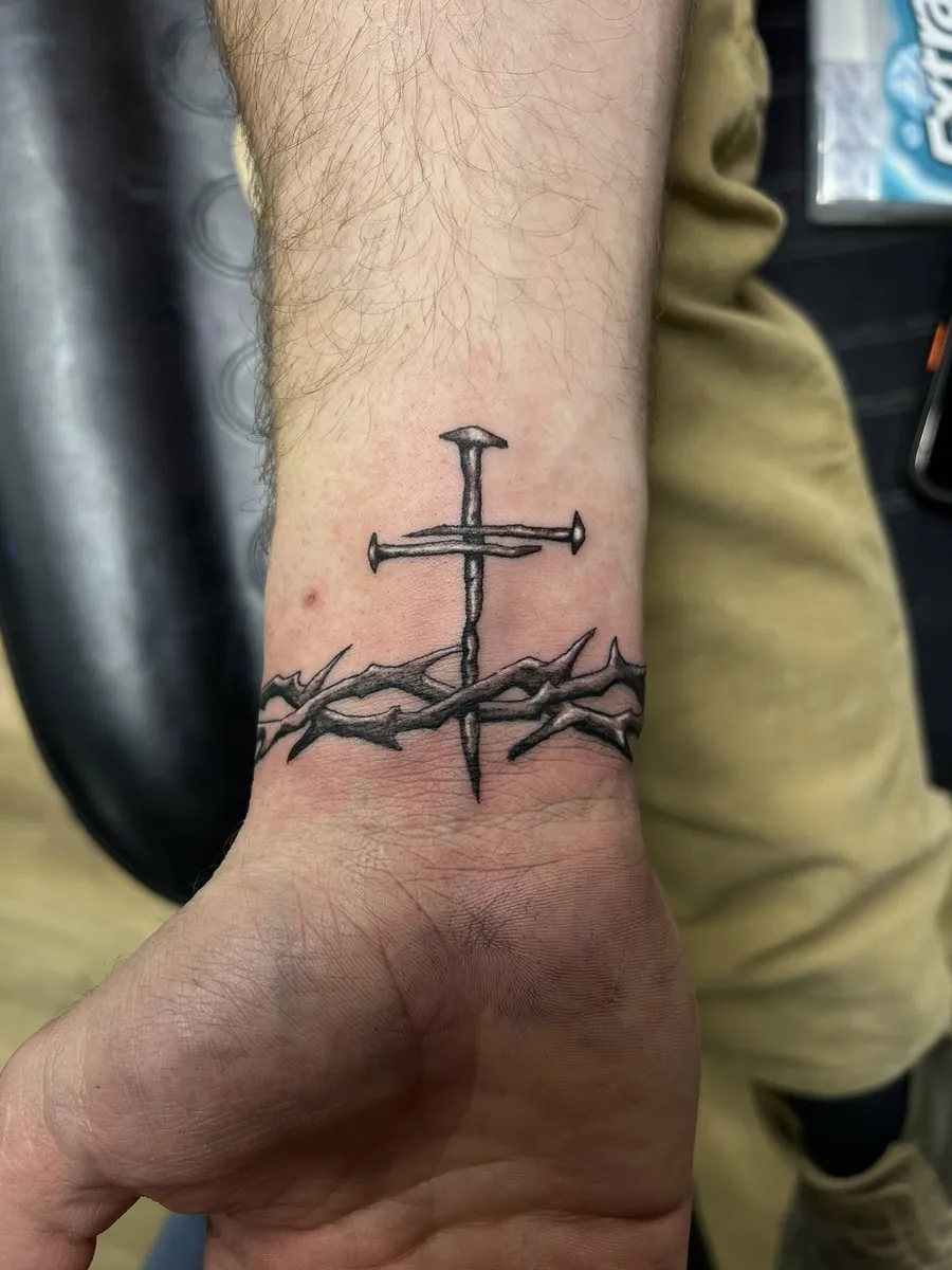 Cross of nails with crown of thorns — wrist