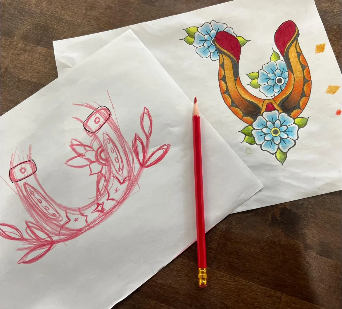 Hand-drawn flash — traditional horseshoes & flowers