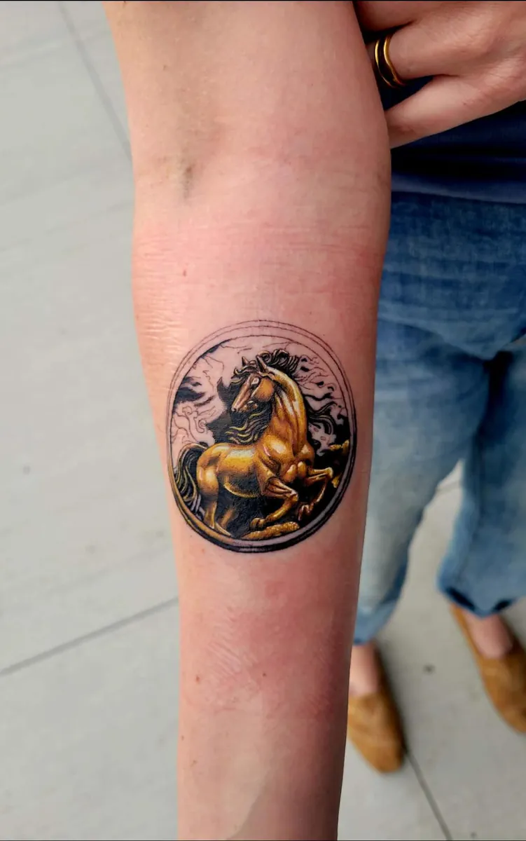 Bronze horse statue medallion — color realism, forearm
