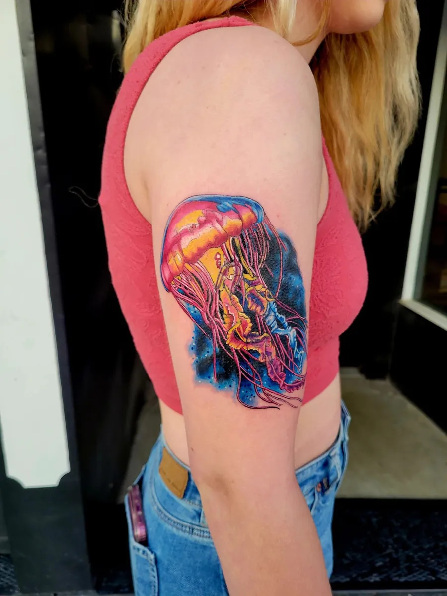 Vibrant color jellyfish on the upper arm