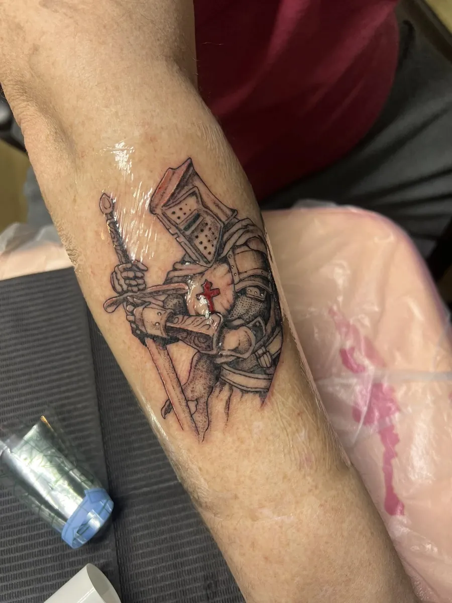Knights Templar crusader with sword and shield — bicep