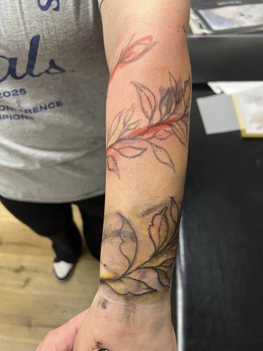 Watercolor leaves & branches — forearm sleeve in progress